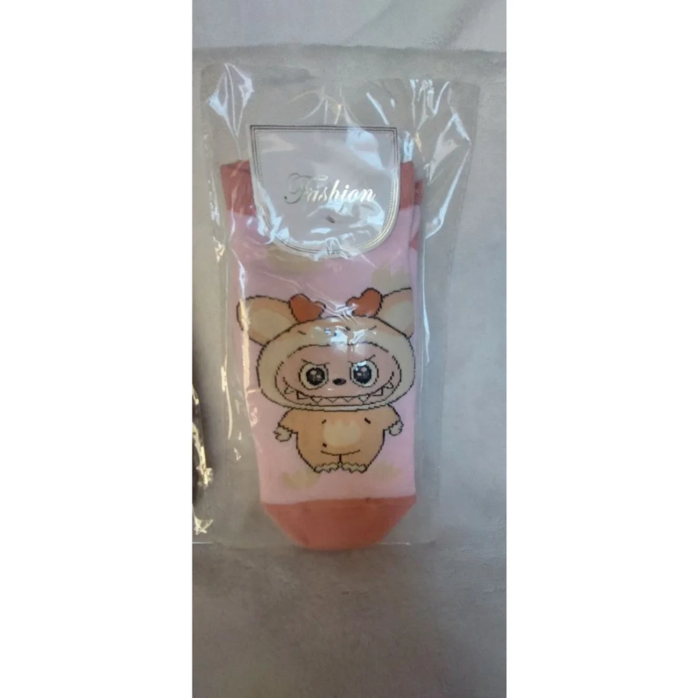 5 pairs of the ugly but cute Labubu Character footies Socks.